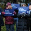 Supporters attend a rally outside the federal courthouse where a federal appeals court will consider whether U.S. President Donald Trump's administration may implement a provision that would deprive Planned Parenthood and its members of Medicaid funding, in Boston, Massachusetts, U.S., November 12, 2025. REUTERS/Brian Snyder