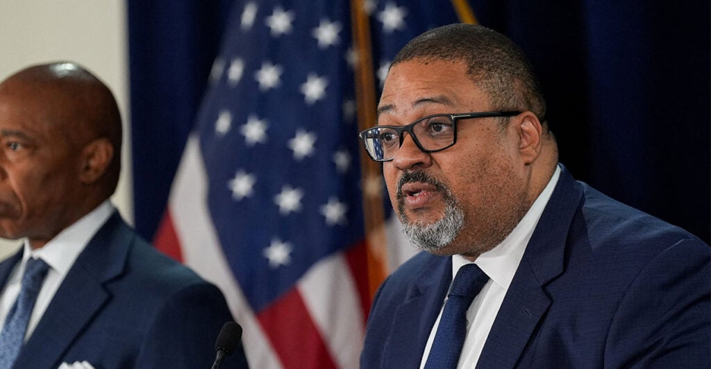 Manhattan District Attorney Alvin Bragg, alongside New York City Mayor Eric Adams, addresses the media about indictments in last month’s shooting of an off-duty federal agent, New York City, U.S., August 6, 2025.