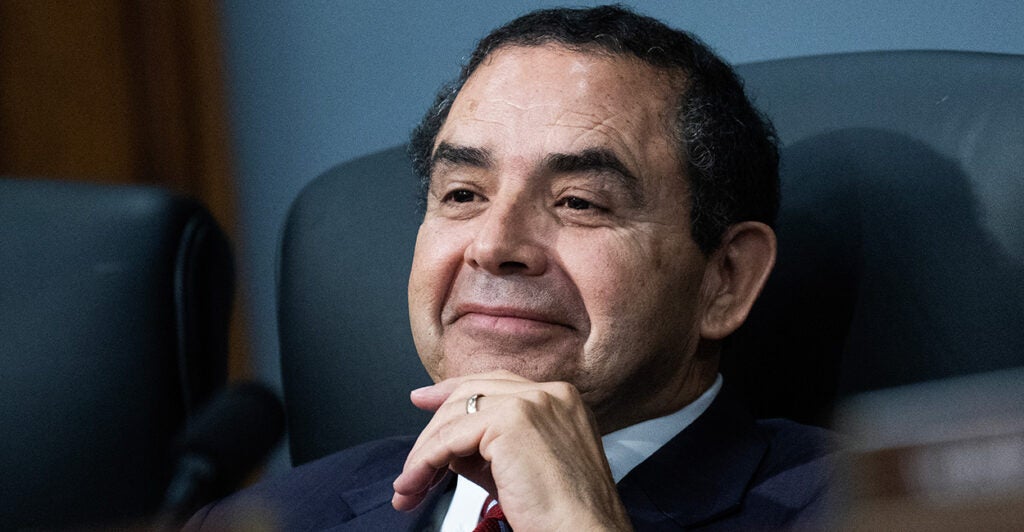 Close-up of a smiling Rep. Henry Cuellar, D-Texas.