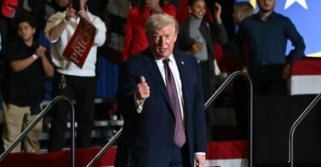 President Trump gives a thumbs up during a rally.