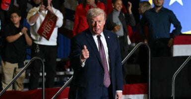 President Trump gives a thumbs up during a rally.