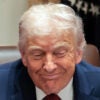 Close up of a smiling President Donald Trump.