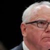 Close-up of a frowning Gov. Tim Walz,