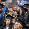 Students at Florida Gator graduation ceremony.