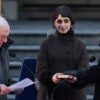 Zohran Mamdani is sworn-in as NYC mayor by socialist Bernie Sanders as his wife looks on, holding a Koran.