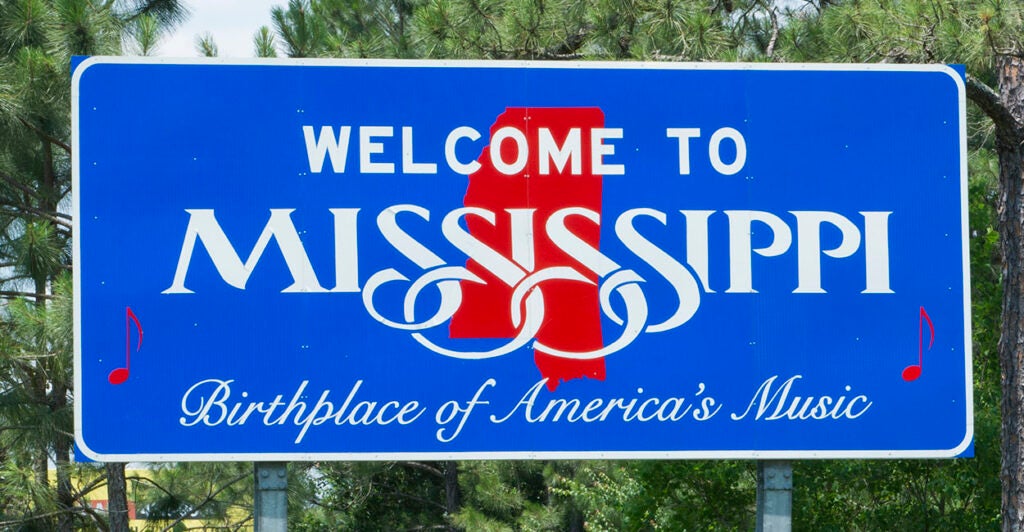 Sign for Welcome to Mississippi Birthplace of American Music. (Photo by: Education Images/Universal Images Group via Getty Images)