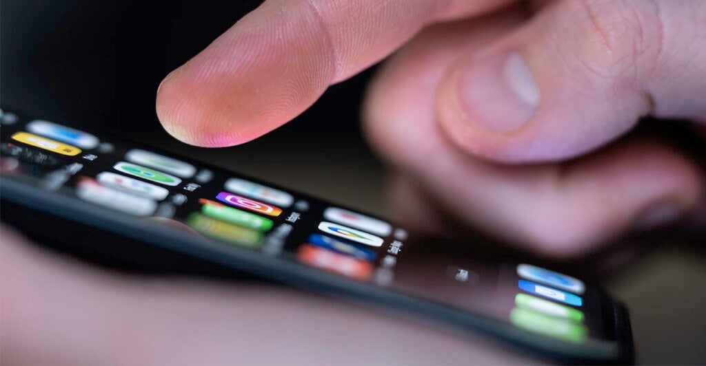 SYMBOL - 25 January 2025, Baden-Württemberg, Rottweil: A man operates an iPhone on which apps can be seen. AI Photo: Silas Stein/dpa (Photo by Silas Stein/picture alliance via Getty Images)