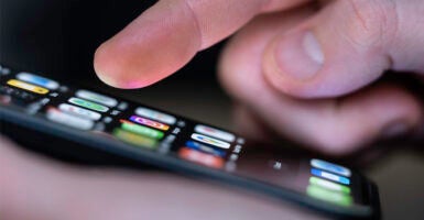 SYMBOL - 25 January 2025, Baden-Württemberg, Rottweil: A man operates an iPhone on which apps can be seen. AI Photo: Silas Stein/dpa (Photo by Silas Stein/picture alliance via Getty Images)