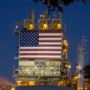 Wilmington, California, An oil refinery, operated by BP, displays a huge American flag. (Photo by: Jim West/UCG/Universal Images Group via Getty Images)