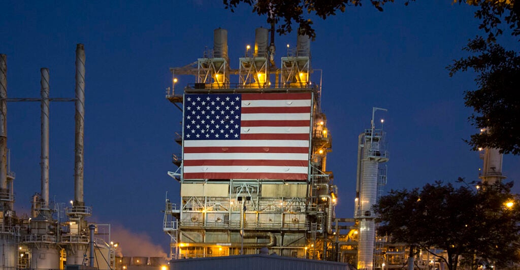 Wilmington, California, An oil refinery, operated by BP, displays a huge American flag. (Photo by: Jim West/UCG/Universal Images Group via Getty Images)