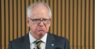 MINNEAPOLIS, MN. - JANUARY 2026: Minnesota Governor Tim Walz speaks during a press conference focused on Minnesota’s new paid family leave policy, Tuesday, January 6, 2026 at the Coliseum Building in Minneapolis, Minn. Walz took questions from the media at the event, a day after he announced that he is withdrawing from the 2026 Minnesota gubernatorial race. (Photo by Alex Kormann/The Minnesota Star Tribune via Getty Images)