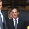 US Representative Chris Collins (C), a leaves US Federal Court in New York on after being indicted on insider trading.