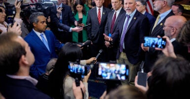 WASHINGTON, DC - MAY 21: Rep. Chip Roy (R-TX) (4th-R), accompanied by Rep. Keith Self (R-TX) (C), Rep. Scott Perry (R-PA) (5th-R), Rep. Andrew Clyde (R-GA) (3nd-R), House Freedom Caucus chair Rep. Andy Harris (R-MD) (2nd-R), and Rep. Clay Higgins (R-LA) (R),
