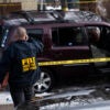 MINNEAPOLIS, MINNESOTA - JANUARY 07: Members of law enforcement work the scene following a suspected shooting by an ICE agent during federal law enforcement operations on January 07, 2026 in Minneapolis, Minnesota. According to federal officials, the agent, "fearing for his life" killed a woman during a confrontation in south Minneapolis. (Photo by Stephen Maturen/Getty Images)