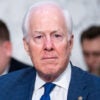 Senator John Cornyn sits in a senate hearing