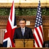 US House Speaker Mike Johnson (C) addresses MPs in the House of Commons alongside Speaker of the House of Lords, Lord McFall (L) and Speaker of the House of Commons Sir Lindsay Hoyle (R) on January 20, 2026 in London, England.