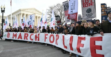 People march near the US Supreme Court during the 53rd annual March for Life rally in Washington, DC, on January 23, 2026.