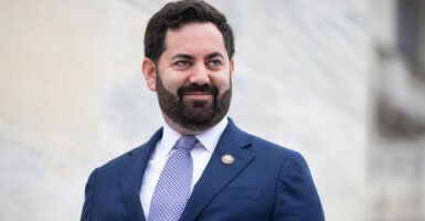 Mike Lawler exits the U.S. Capitol.