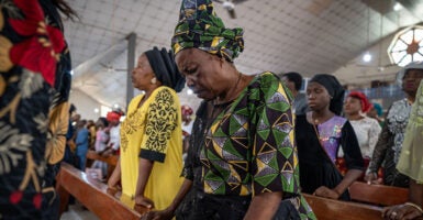 Catholics pray at the Saint Michael's Cathedral during the Sunday's service in Minna on November 30, 2025 as the congregatipon prayed for the safe return of the abducted students of Saint Mary's Catholic School earlier this month. (Photo by Light Oriye Tamunotonye / AFP via Getty Images)