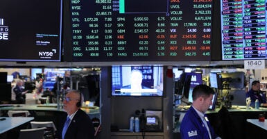 NEW YORK, NEW YORK - JANUARY 06: Traders work on the floor of the New York Stock Exchange during morning trading on January 06, 2026 in New York City. Stocks opened slightly up after a rally that saw the Dow Jones jump over 500 points. (Photo by Michael M. Santiago/Getty Images)