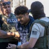WASHINGTON, DC - AUGUST 30: ICE Enforcement and Removal Operations arrest a man they chased several blocks for an unknown reason on Georgia Avenue on August 30, 2025 in Washington, DC. An increased presence of law enforcement has been seen throughout the nation's capital since U.S. President Donald Trump announced plans to deploy federal officers and the U.S. National Guard. (Photo by Tasos Katopodis/Getty Images)