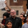 2025/09/24: Migrant supporters stand in front of the federal courthouse during demonstration. Protest in Support of Victor Sanchez a migrant community leader detained by I.C.E at Abraham A. Ribicoff United States Court House. (Photo by Roy De La Cruz/SOPA Images/LightRocket via Getty Images)