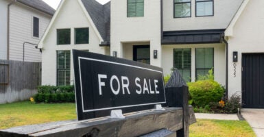 HOUSTON, TEXAS - OCTOBER 27: A for sale sign is seen in front of a house in a Spring Branch neighborhood in Houston, Monday, Oct. 27, 2025. (Kirk Sides/Houston Chronicle via Getty Images)