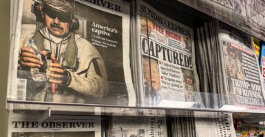 CHILCOMPTON, UNITED KINGDOM - JANUARY 04: UK newspaper front pages display stories on the capture and arrest of President Nicolas Maduro from Venezuela in a newsagent shop, on January 4, 2026 in Somerset, England. (Photo by Matt Cardy/Getty Images)