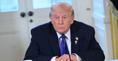 US President Donald Trump looks on during a meeting with US oil companies executives in the East Room of the White House in Washington, DC on January 9, 2026. President Trump is aiming to convince oil executives to support his plans in Venezuela, a country whose energy resources he says he expects to control for years to come. US forces seized Venezuelan president Nicolas Maduro in a sweeping military operation on January 3, with Trump making no secret that control of Venezuela's oil was at the heart of his actions. (Photo by SAUL LOEB / AFP via Getty Images)