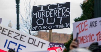 Demonstrators protest Immigration and Customs Enforcement outside the James T. Foley Courthouse on Thursday, Jan. 8, 2025, in Albany, NY. The rally comes on the heels of a fatal shooting of Renee Macklin Good by an ICE officer in Minneapolis a day earlier. (Jim Franco/Albany Times Union via Getty Images)
