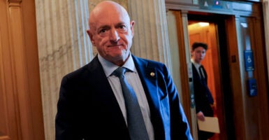 Senator Mark Kelly (D-AZ) leaves the Senate floor after speaking on January 12, 2026 in Washington, DC. Kelly spoke about the lawsuit he filed against United States Secretary of War Pete Hegseth's attempt to censure and demote him. (Photo by Heather Diehl/Getty Images)