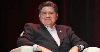 CHICAGO, ILLINOIS - NOVEMBER 12: Illinois Gov. JB Pritzker speaks on stage during Vox Media's Pivot Tour at The Chicago Theatre on November 12, 2025 in Chicago, Illinois. (Photo by Daniel Boczarski/Getty Images for Vox Media)