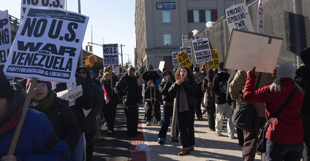 Protesters rally against President Donald Trump's extradition of Nicolas Maduro from Venezuela. Asra Nomani has described the groups organizing the protests as a potential foreign influence campaign.