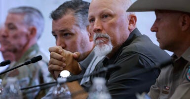 Rep. Chip Roy (R-TX) (3rd L) and Sen. Ted Cruz (R-TX) (2nd L) join President Donald Trump, state and local leaders, first responders and victims of last week's flash flooding during a meeting at the Hill Country Youth Event Center on July 11, 2025 in Kerrville, Texas