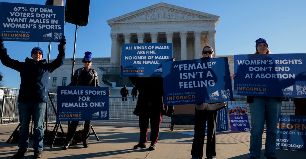 WASHINGTON, DC - JANUARY 13: Protesters who align with the Democratic Party but are against transgender athletes competing in women's sports gather outside the Supreme Court on January 13, 2026 in Washington, DC. Groups from both sides of the debate gathered on Tuesday morning to protest while two cases that prohibit transgender girls from joining girls' and women's sports teams are heard inside the Supreme Court. (Photo by Heather Diehl/Getty Images)