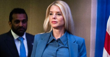 UNITED STATES - DECEMBER 4: Attorney General Pam Bondi and FBI Director Kash Patel arrive for a news conference at the Department of Justice on Thursday, December 4, 2025, announcing the arrest of Brian Cole Jr., who allegedly placed pipe bombs near the Republican and Democratic National Committee offices on January 6, 2021. (Tom Williams/CQ-Roll Call, Inc via Getty Images)