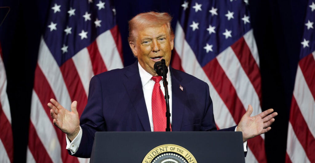 President Donald Trump addresses a House Republican retreat