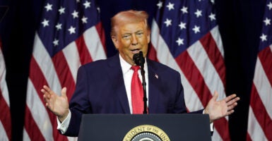 President Donald Trump addresses a House Republican retreat