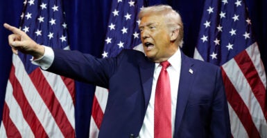 President Donald Trump departs after speaking during a House Republican retreat