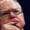 FILE PHOTO: Minnesota Governor Tim Walz looks on during a House Oversight Committee hearing with U.S. governors about state policies regarding undocumented migrants, on Capitol Hill in Washington, D.C., U.S., June 12, 2025. REUTERS/Kevin Lamarque/File Photo