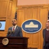 State Rep. Josh Williams, R-Ohio, speaks at the podium during a press conference at the Ohio Statehouse as Attorney General Dave Yost stands off to the side.