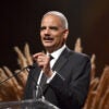 SANTA MONICA, CALIFORNIA - OCTOBER 10: 82nd Attorney General of the U.S. Eric Holder speaks onstage during City Of Hope Spirit Of Life Gala 2019 on October 10, 2019 in Santa Monica, California.