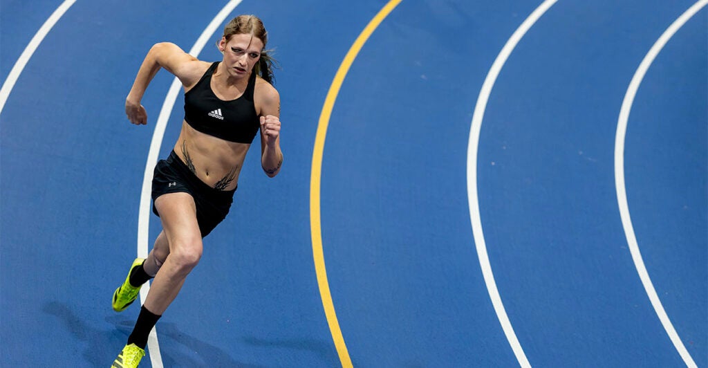 NEW YORK, NEW YORK - DECEMBER 06: Sadie Schreiner competes in the Women's 300m heats during the TCNJ Indoor Open at the Armory Track and Field Center on December 06, 2025 in New York City. Sadie Schreiner is a transgender sprinter who rose to prominence competing for the Rochester Institute of Technology (RIT), where she became a two-time NCAA Division III All-American in the 200m and 400m. Her achievements include setting a Liberty League championship meet record in the 400m with a time of 55.07 seconds. She began her transition during her senior year of high school, undergoing hormone therapy that significantly altered her physiology, including reducing muscle mass and lung capacity. Despite these changes, she continued to excel on the track. Schreiner’s collegiate athletic career has faced significant challenges following policy shifts by the NCAA and an executive order signed by President Donald Trump, which restricted transgender women from participating in women’s sports. As a result, Schreiner was barred from competing in NCAA events and faced difficulties transferring to Division I programs, as many institutions withdrew scholarship offers, and state laws barred transgender athletes from competing in women’s sports. Despite these setbacks, Schreiner remains committed to advocating for transgender inclusion in athletics and continues to seek out competition, even outside the U.S., where policies are more inclusive. (Photo by Al Bello/Getty Images)