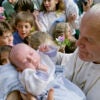 Pope John Paul II blesses 06 October 1986 in Ars a baby during the third day of his visit to Lyon's area. The pontiff was visiting from 04 to 07 October East and Central regions of France (it was his 31th International Pastoral visit). AFP PHOTO DANIEL JANIN (Photo credit should read DANIEL JANIN/AFP via Getty Images)