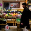 People shop for fruit in a grocery store in the Manhattan borough of New York City on December 13, 2025. (Photo by CHARLY TRIBALLEAU / AFP via Getty Images)