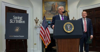 WASHINGTON, DC - FEBRUARY 12: U.S. President Donald Trump (L) speaks alongside U.S. Environmental Protection Agency Administrator Lee Zeldin during an event to announce a rollback of the 2009 Endangerment Finding in the Roosevelt Room at the White House on February 12, 2026 in Washington, DC. The Trump administration will repeal the 2009 central scientific finding that allows the EPA to regulate climate-warming emissions. (Photo by Anna Moneymaker/Getty Images)