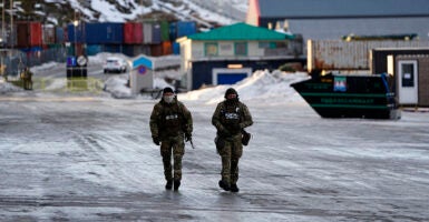 Soldiers are pictured as they guard the harbor in Nuuk, Greenland, on January 25, 2026. (Photo by Mads Claus Rasmussen / Ritzau Scanpix / AFP via Getty Images) / Denmark OUT