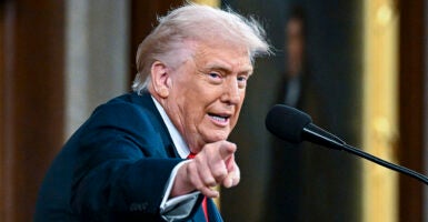 WASHINGTON, DC - FEBRUARY 24: U.S. President Donald Trump delivers the State of the Union address during a joint session of Congress in the House Chamber at the Capitol on February 24, 2026 in Washington, DC. Trump delivered his address days after the Supreme Court struck down the administration's tariff strategy, and amid a U.S. military buildup in the Persian Gulf threatening Iran. (Photo by Kenny Holston-Pool/Getty Images)