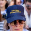 WASHINGTON, DC - MAY 2: A woman wears a hat that reads "Curb Your Antisemitism" during a rally against campus antisemitism at George Washington University on May 2, 2024 in Washington, DC. A pro-Palestinian rally was also held at the school today, as protestors at college campuses around the country call for schools to divest from Israeli interests amid the ongoing war in Gaza. (Photo by Andrew Harnik/Getty Images)