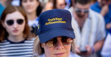 WASHINGTON, DC - MAY 2: A woman wears a hat that reads 